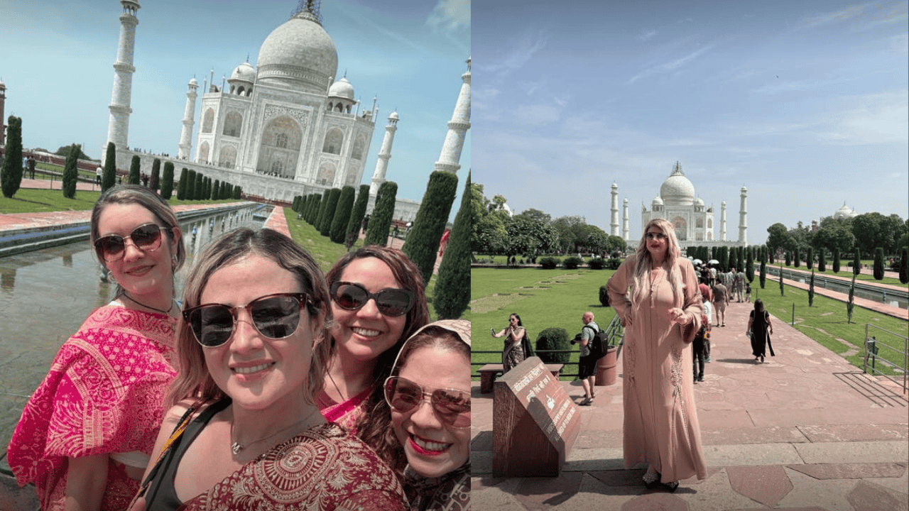 Tourists enjoying Golden Triangle India Tour Packages at Agra’s Taj Mahal